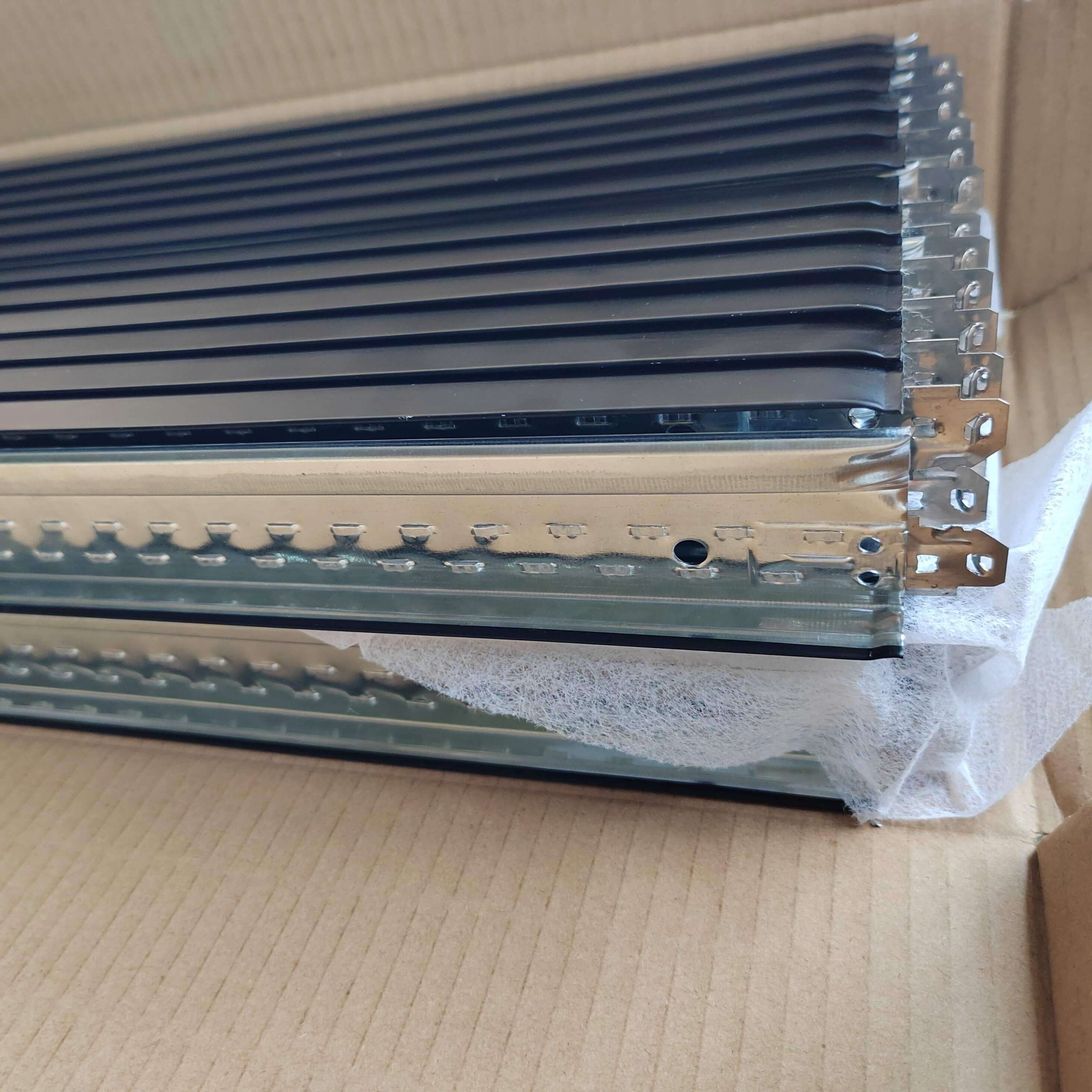 close up of ceiling grid end connectors